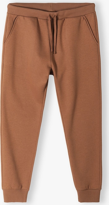 Brązowe spodnie Family Concept By 5.10.15. z dresówki w młodzieżowym stylu