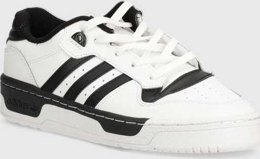 Buty sportowe Adidas Originals sznurowane z płaską podeszwą w sportowym stylu