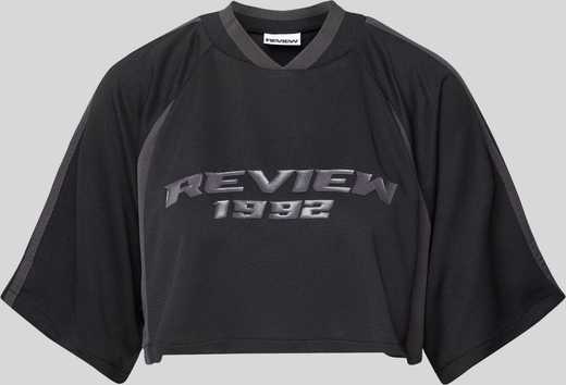 Czarna bluzka Review w młodzieżowym stylu z krótkim rękawem