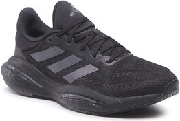 Czarne buty sportowe Adidas z płaską podeszwą w sportowym stylu sznurowane