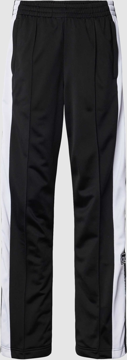 Czarne spodnie Adidas Originals w sportowym stylu