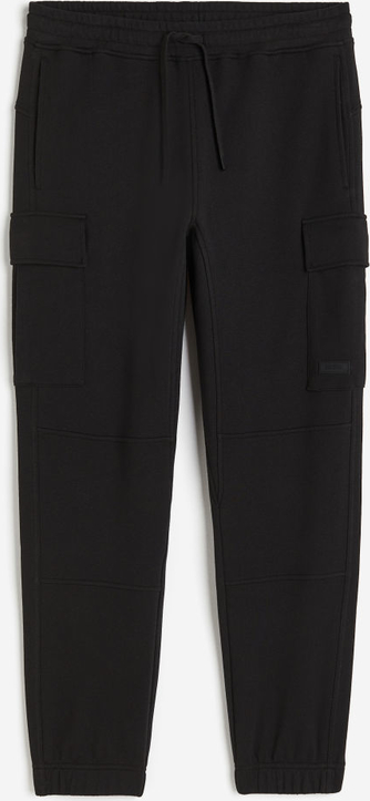 Czarne spodnie H & M w sportowym stylu z dresówki