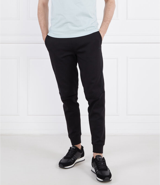 Czarne spodnie sportowe Calvin Klein w sportowym stylu