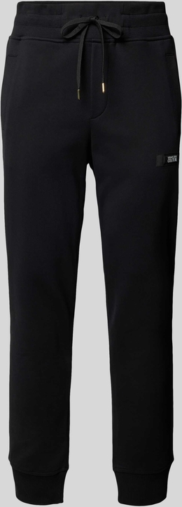 Czarne spodnie Versace Jeans z bawełny w sportowym stylu