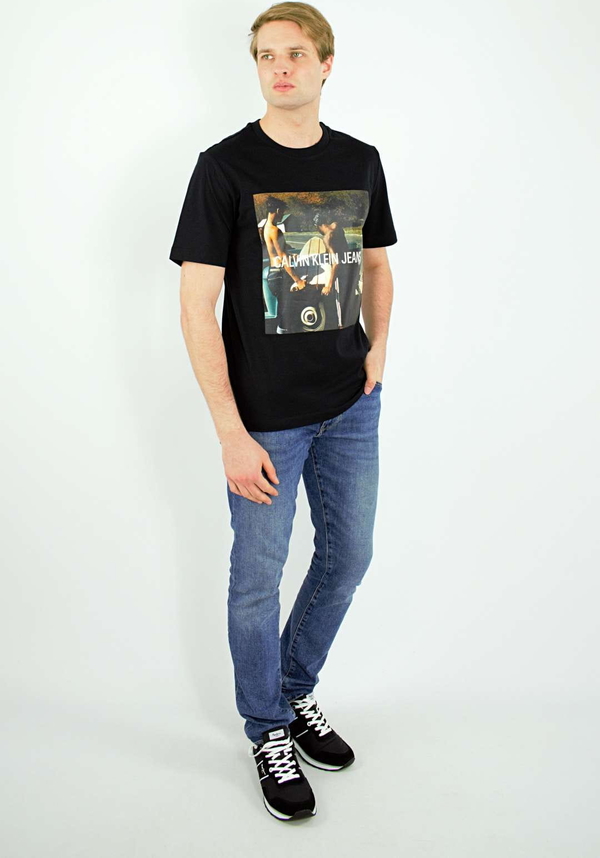 Czarny t-shirt Calvin Klein z nadrukiem w młodzieżowym stylu z bawełny