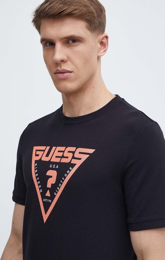 Czarny t-shirt Guess w młodzieżowym stylu z bawełny z krótkim rękawem