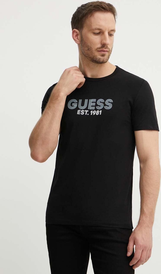 Czarny t-shirt Guess w młodzieżowym stylu z bawełny z nadrukiem