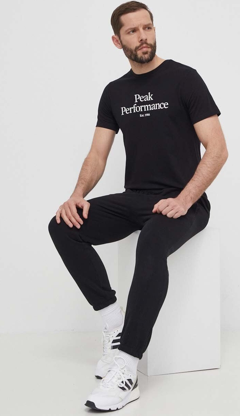Czarny t-shirt Peak performance z bawełny w młodzieżowym stylu z nadrukiem
