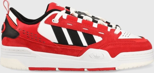 Czerwone buty sportowe Adidas Originals sznurowane w sportowym stylu