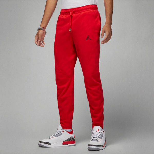 Czerwone spodnie Jordan w sportowym stylu z dresówki