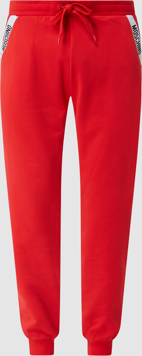 Czerwone spodnie Moschino z bawełny w sportowym stylu