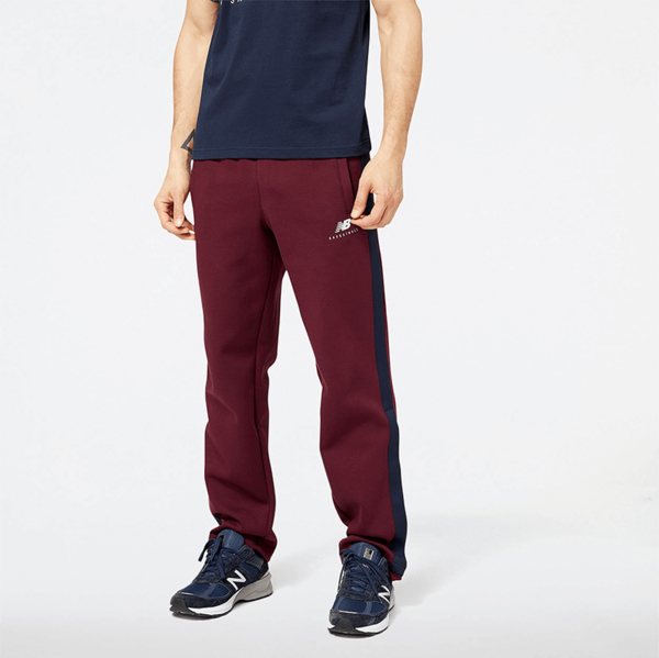 Czerwone spodnie New Balance z bawełny w sportowym stylu