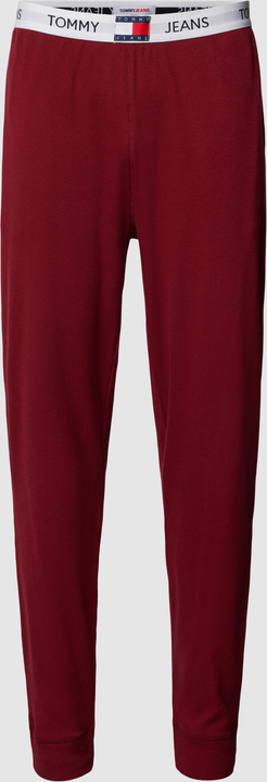 Czerwone spodnie Tommy Jeans z dresówki