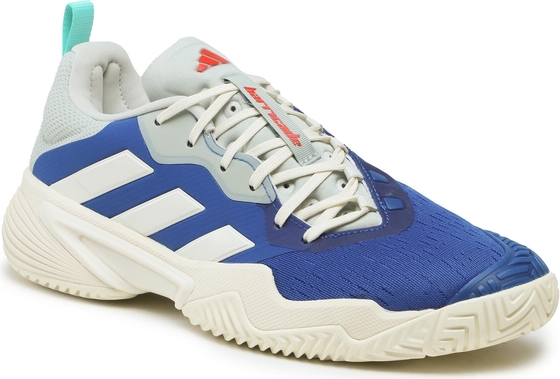 Granatowe buty sportowe Adidas w sportowym stylu