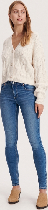 Granatowe jeansy Reserved z tkaniny