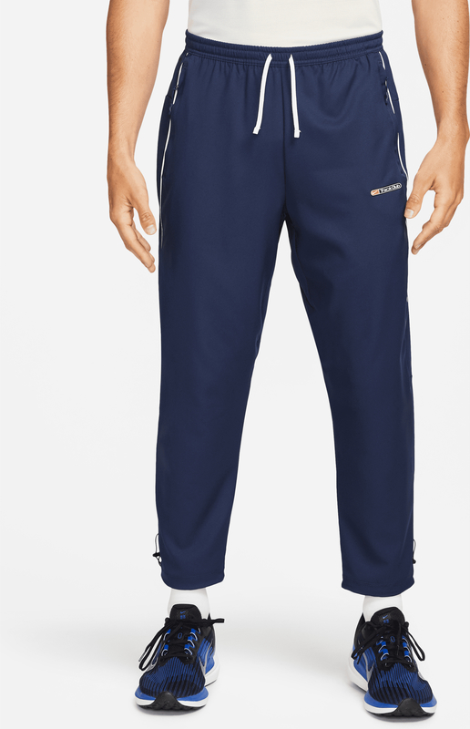 Granatowe spodnie Nike w sportowym stylu