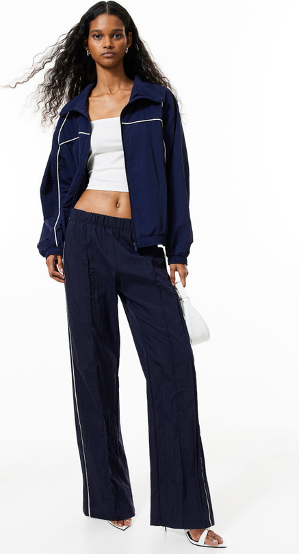 Granatowe spodnie sportowe H & M z tkaniny