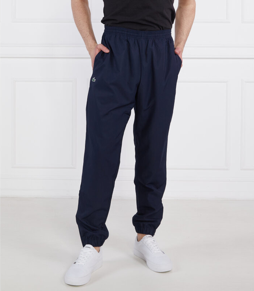 Granatowe spodnie sportowe Lacoste w stylu casual