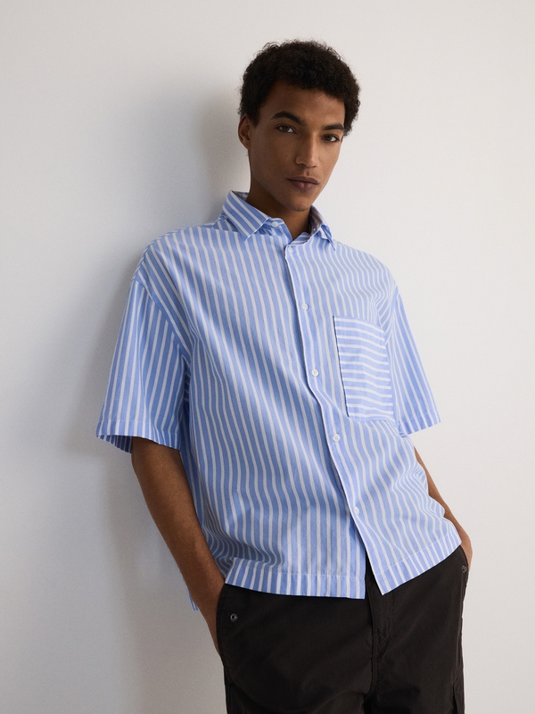 Niebieska koszula Reserved z tkaniny w stylu casual z krótkim rękawem