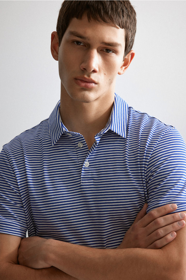 Niebieska koszulka polo H & M w stylu casual z krótkim rękawem
