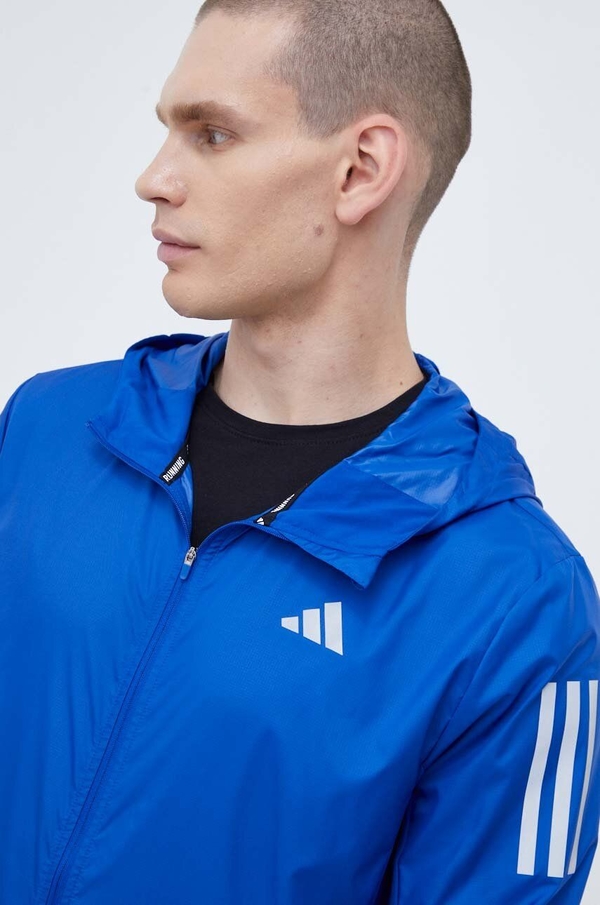 Niebieska kurtka Adidas Performance w sportowym stylu z tkaniny