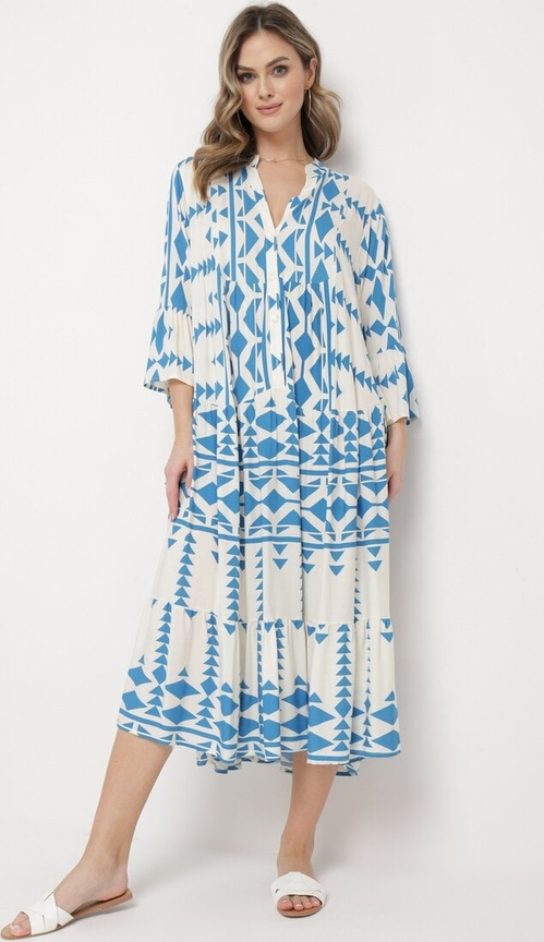 Niebieska sukienka born2be z długim rękawem w geometryczne wzory midi