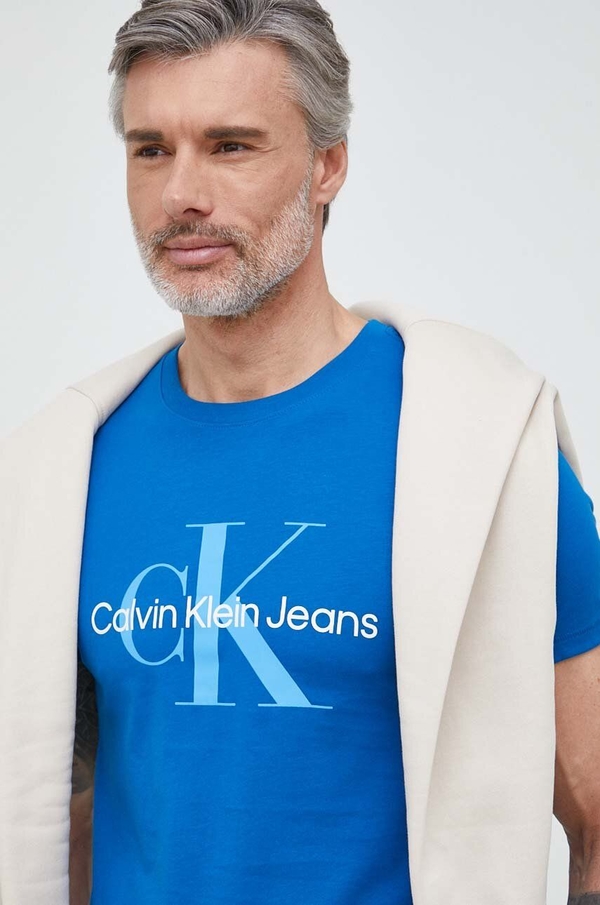 Niebieski t-shirt Calvin Klein w młodzieżowym stylu z krótkim rękawem