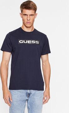 Niebieski t-shirt Guess w młodzieżowym stylu