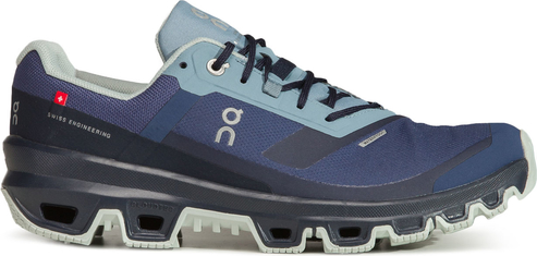 Niebieskie buty sportowe On Running z płaską podeszwą sznurowane w sportowym stylu