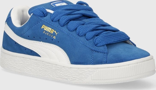 Niebieskie buty sportowe Puma ze skóry sznurowane w sportowym stylu