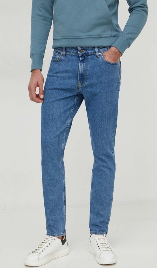 Niebieskie jeansy Calvin Klein z bawełny w street stylu