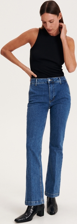 Niebieskie jeansy Reserved z bawełny