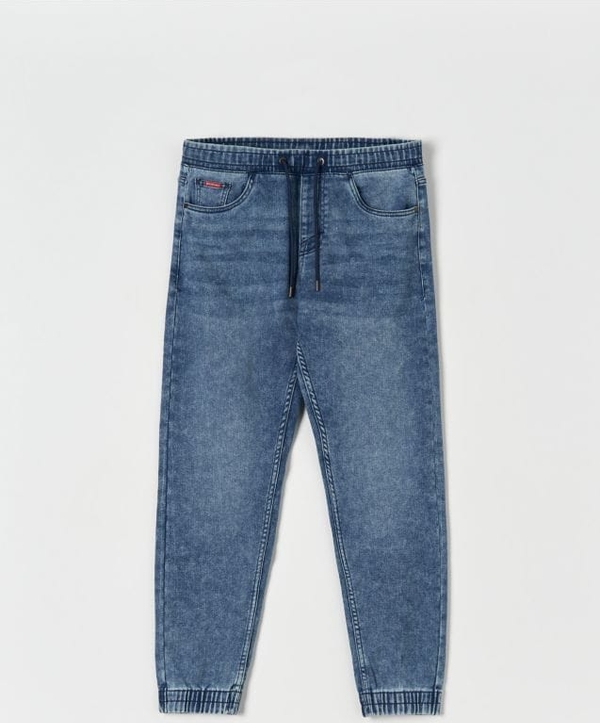 Niebieskie jeansy Sinsay z bawełny w street stylu