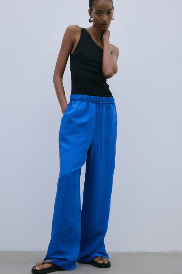 Niebieskie spodnie H & M w stylu retro z tkaniny