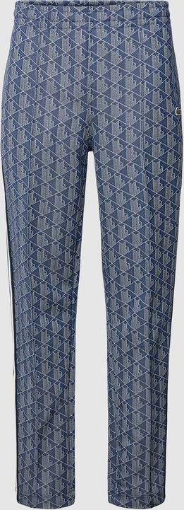 Niebieskie spodnie Lacoste w młodzieżowym stylu z bawełny