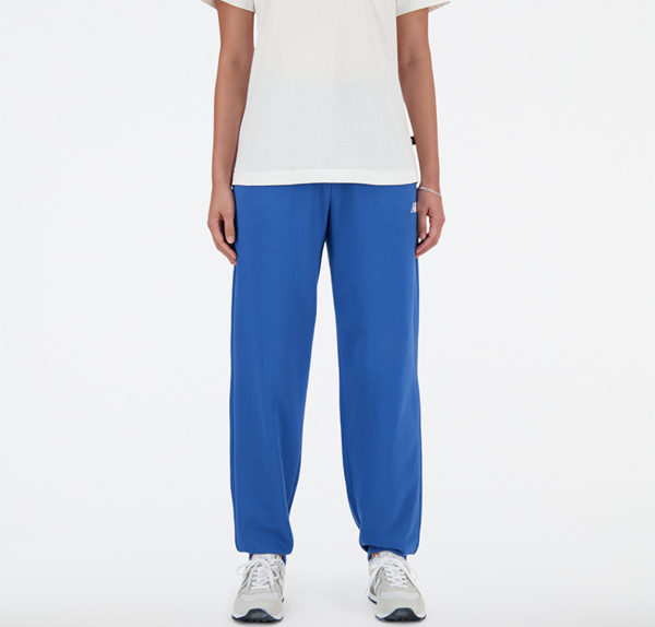 Niebieskie spodnie New Balance z bawełny w sportowym stylu