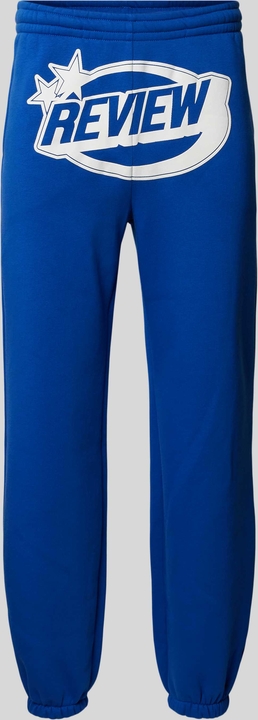 Niebieskie spodnie Review w sportowym stylu z nadrukiem
