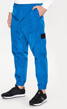 Niebieskie spodnie sportowe Calvin Klein z dresówki w sportowym stylu