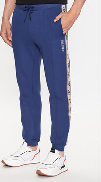 Niebieskie spodnie sportowe Guess w sportowym stylu z dresówki
