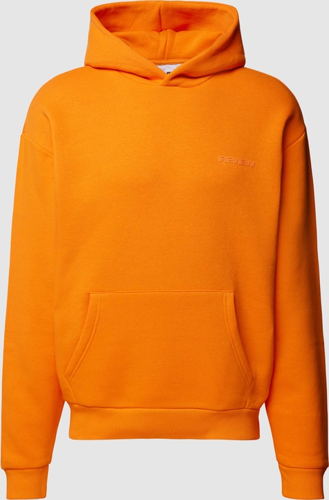 Pomarańczowa bluza Review w młodzieżowym stylu