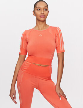 Pomarańczowa bluzka Adidas w sportowym stylu z krótkim rękawem