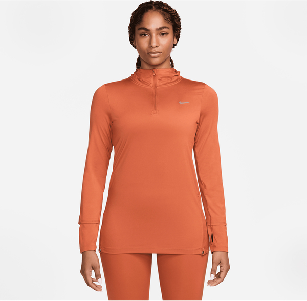 Pomarańczowa bluzka Nike w sportowym stylu z golfem z długim rękawem