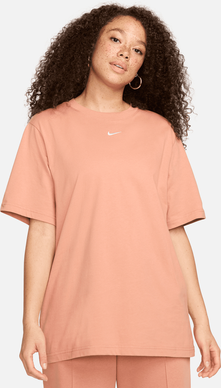 Pomarańczowa bluzka Nike z okrągłym dekoltem w sportowym stylu