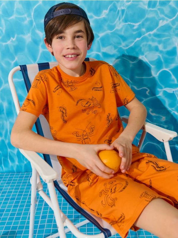 Pomarańczowa koszulka dziecięca Sinsay