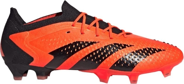 Pomarańczowe buty sportowe Adidas sznurowane w sportowym stylu
