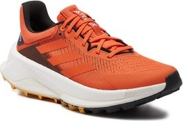 Pomarańczowe buty sportowe Adidas terrex sznurowane w sportowym stylu