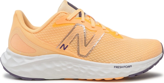 Pomarańczowe buty sportowe New Balance z płaską podeszwą w sportowym stylu