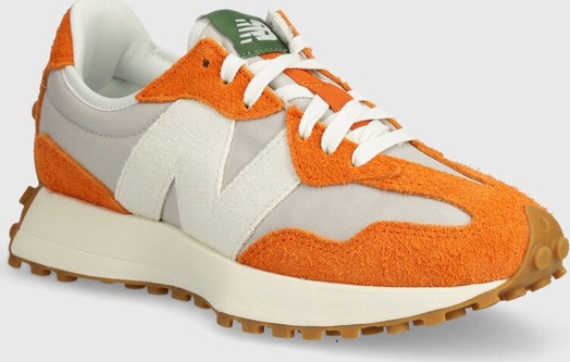 Pomarańczowe buty sportowe New Balance z płaską podeszwą w sportowym stylu