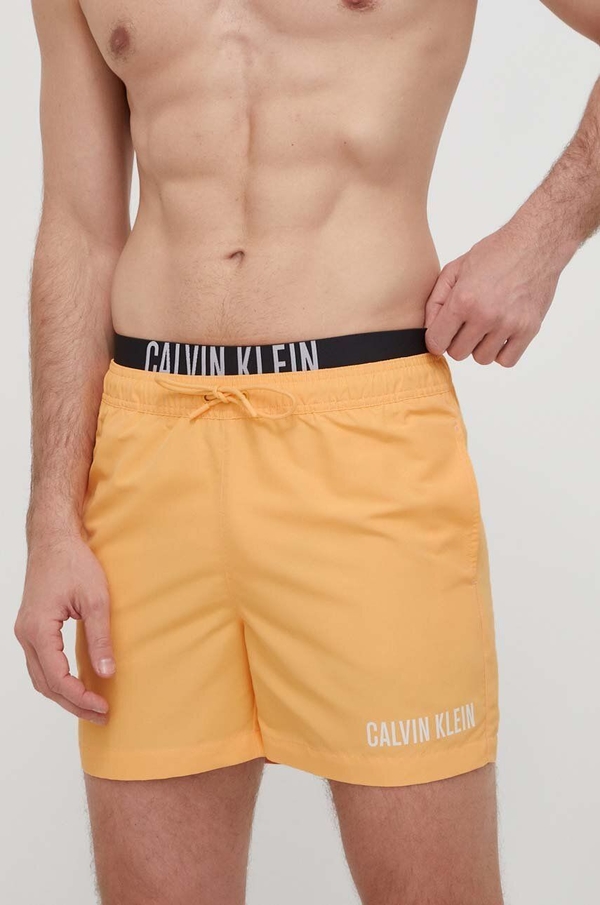 Pomarańczowe kąpielówki Calvin Klein
