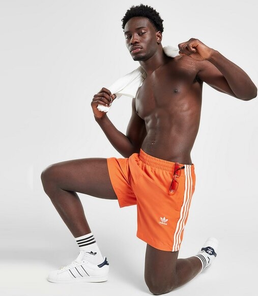 Pomarańczowe spodenki Adidas